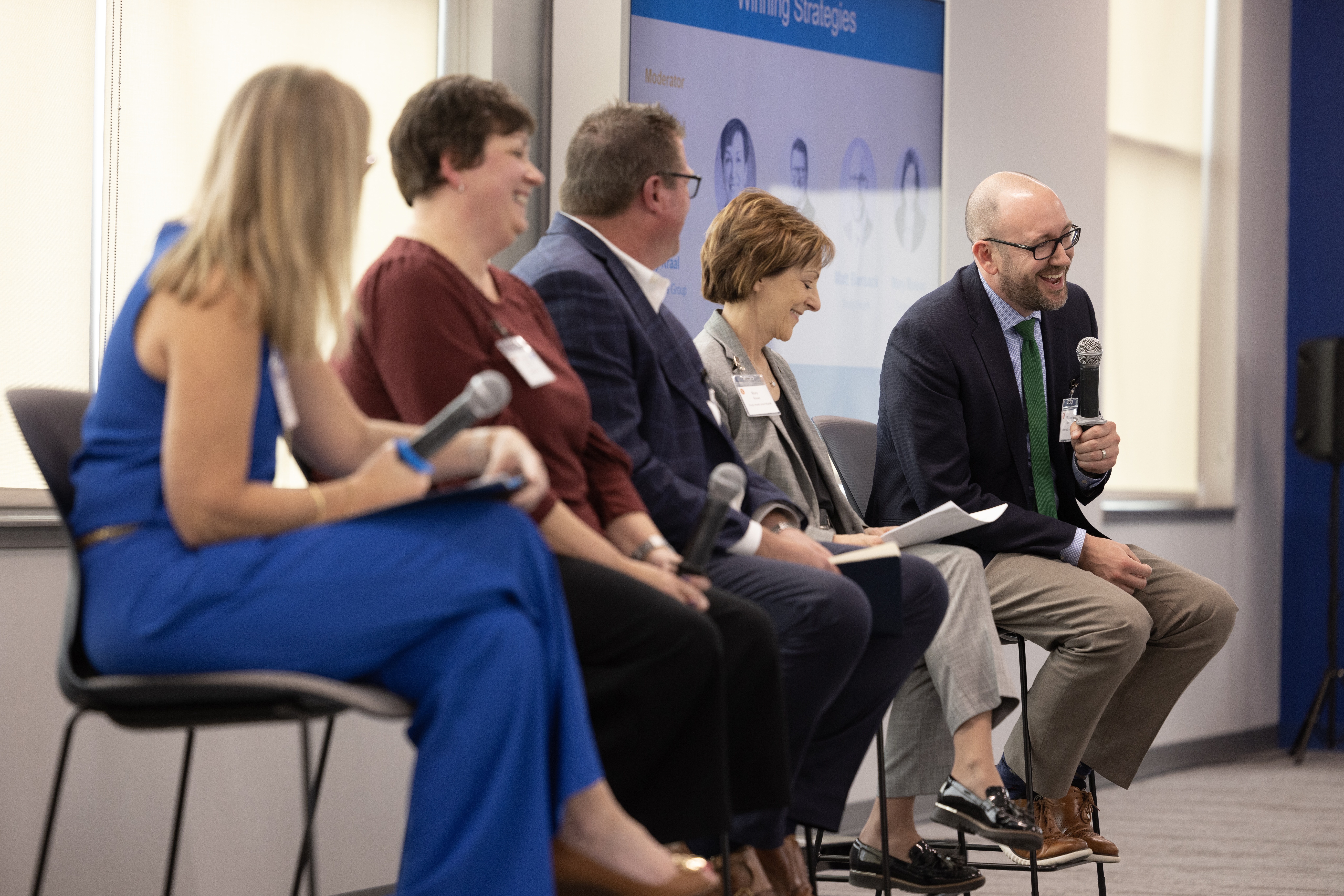 Panel discussion with business leader and HR executives.